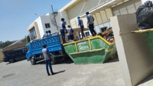 Workers removing rubbish from a residential property in Dubai