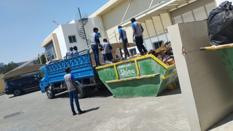 Waste removal team loading furniture onto truck for same day pickup in Dubai