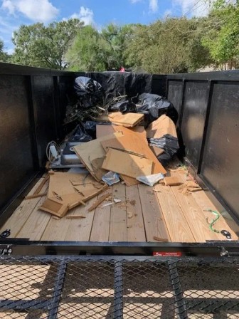 Professional team performing fast and reliable junk removal at a Dubai property