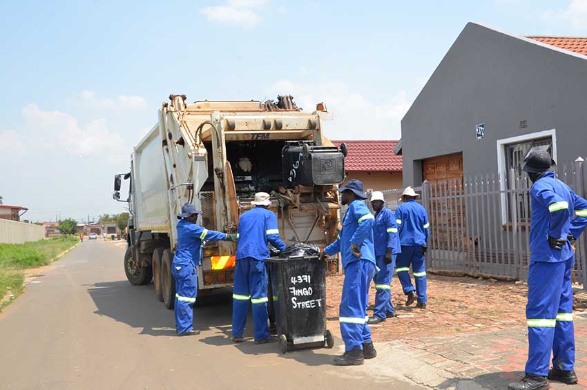 Khalid Baloch Land Transport crew performing same-day emergency rubbish removal in a Dubai residential area